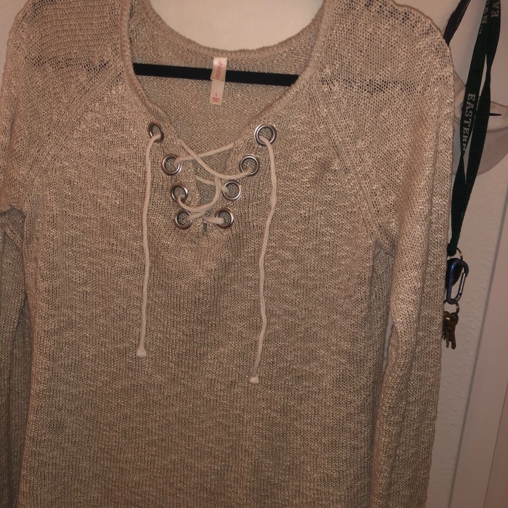 Lightweight sweater with tie up front